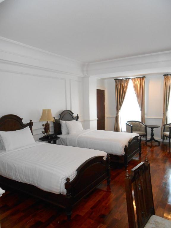 Dhavara Boutique Hotel Вьентьян Номер фото